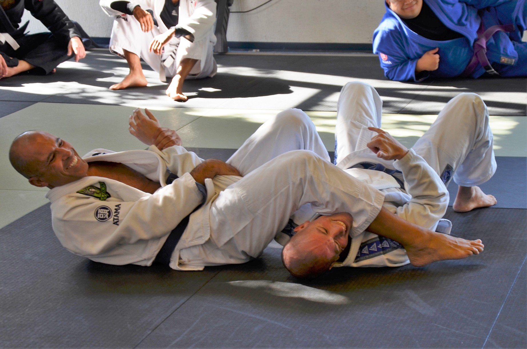 Receiving instruction from Martial Arts Legend, Royce Gracie Todd doing jiu jitsu